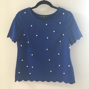 Blue top with pearls